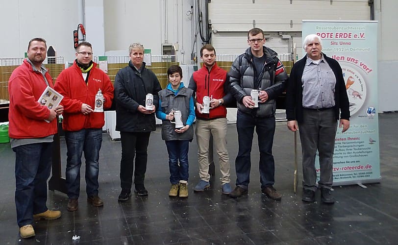 Die Aussteller der Championtiere mit dem Preisrichter-Obmann und dem Ausstellungsleiter